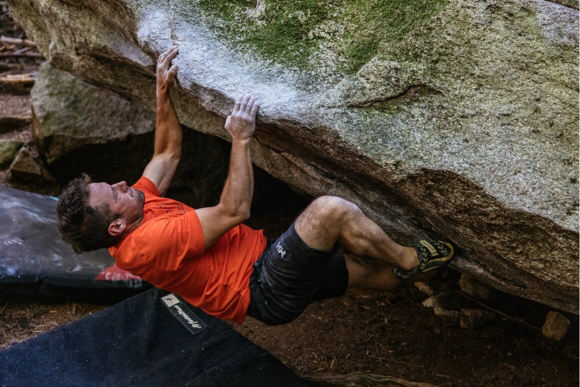 man rock climbing