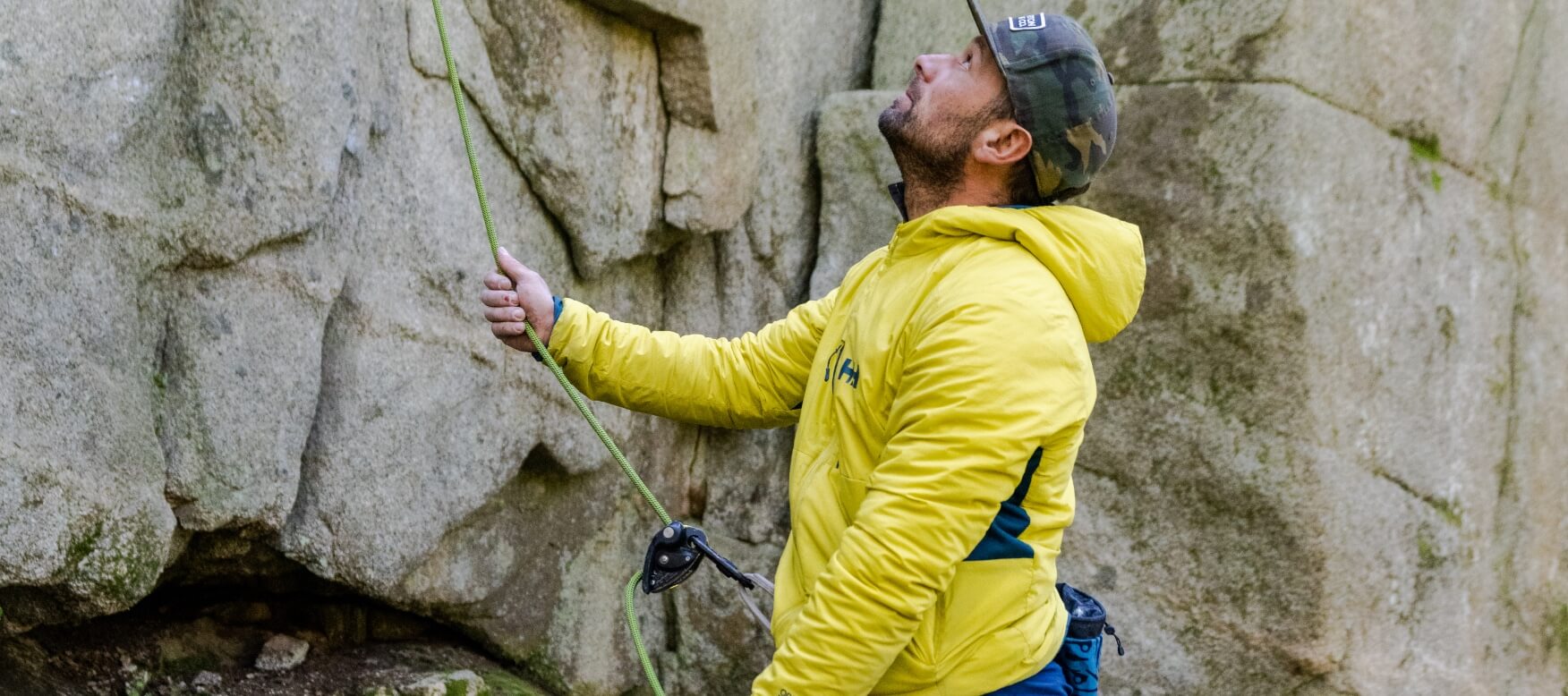 man rock climbing