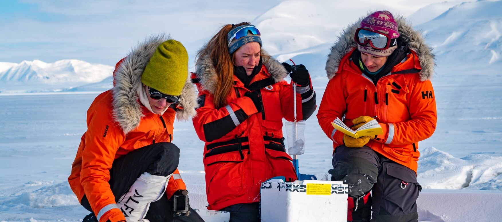 3 female scientists in the arctic 