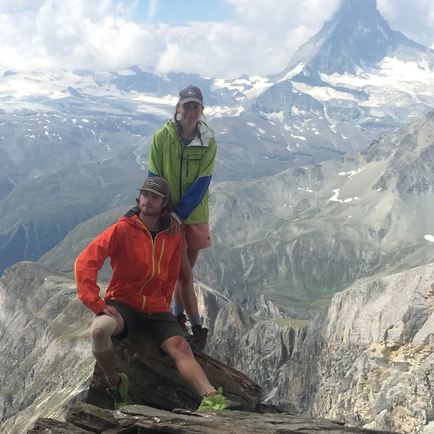 two friends at the top of the mountain