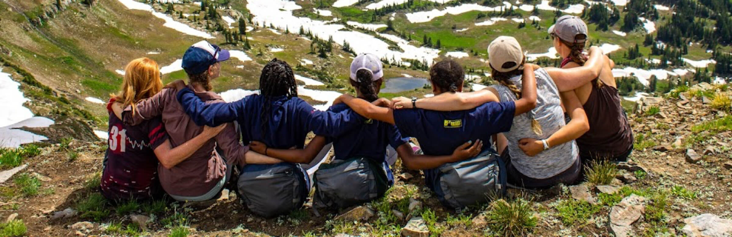 group of people in the mountains