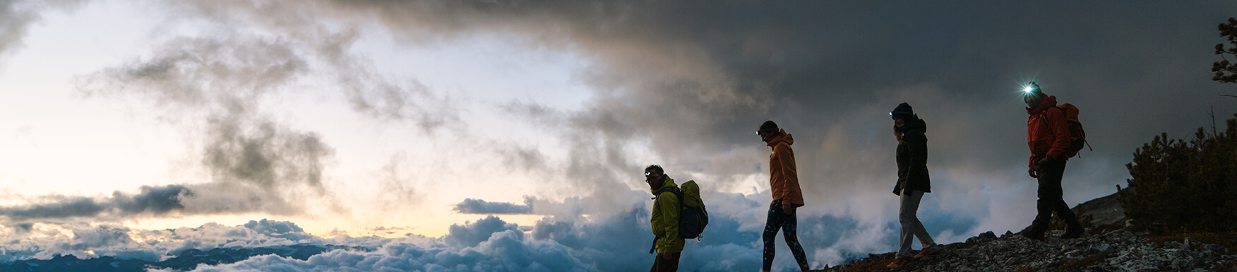 people hiking a ridge