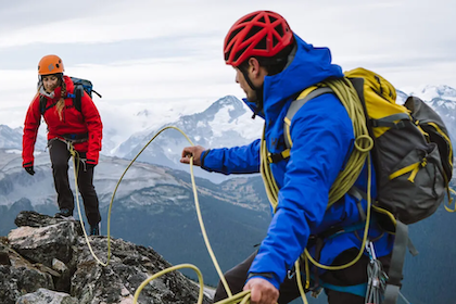 2 people climbing mountain in odin 9 worlds 2.0 jacket