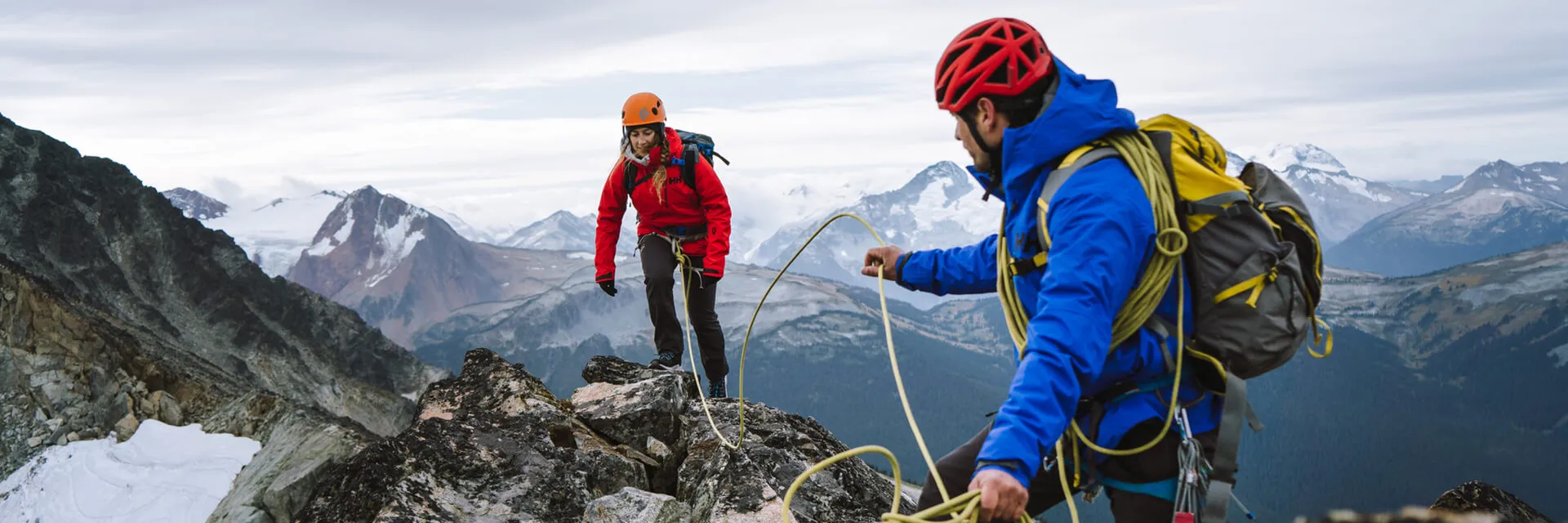 2 people climbing mountain in odin 9 worlds 2.0 jacket