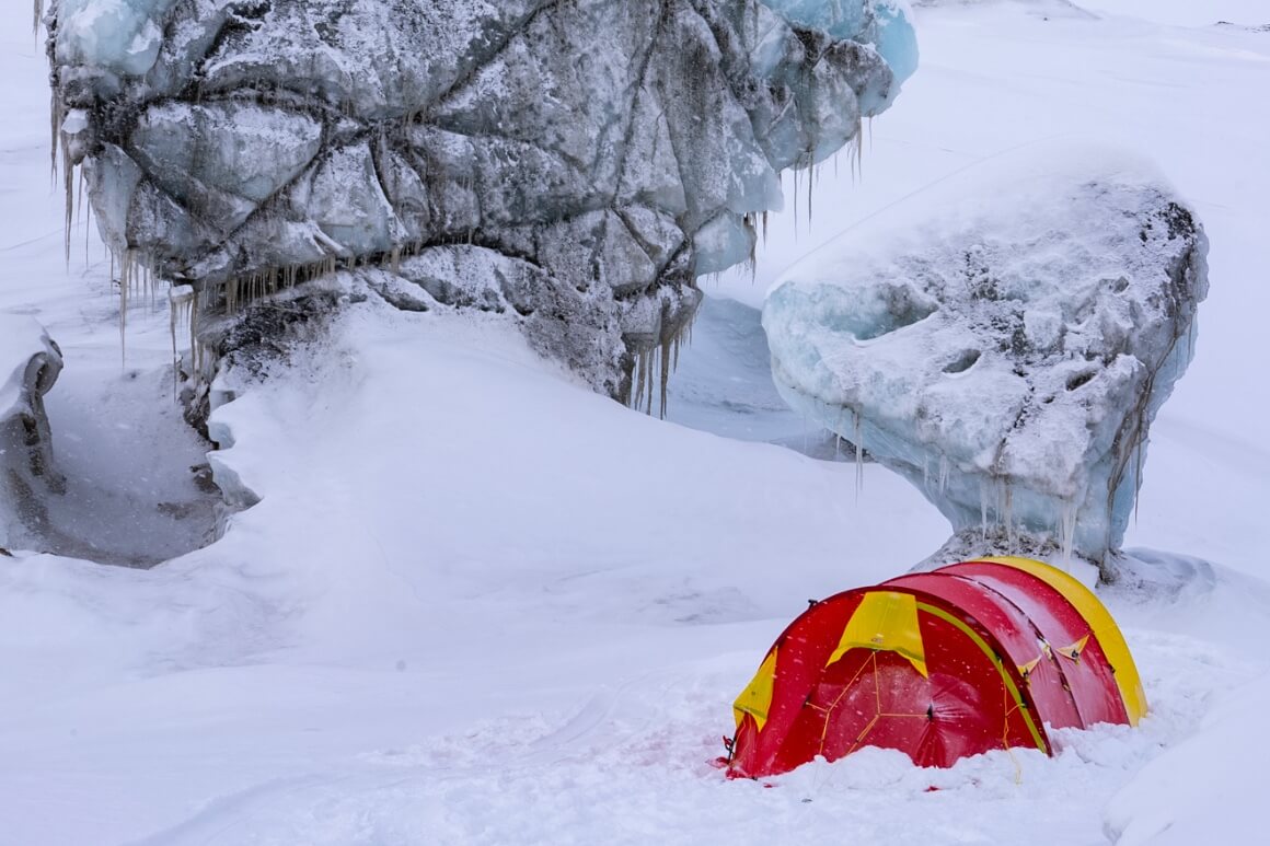 tent buried under snow