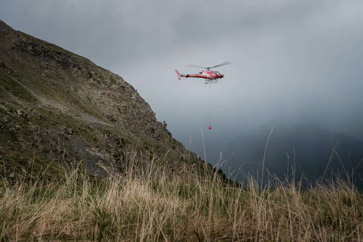 helicopter using recco in the mountains