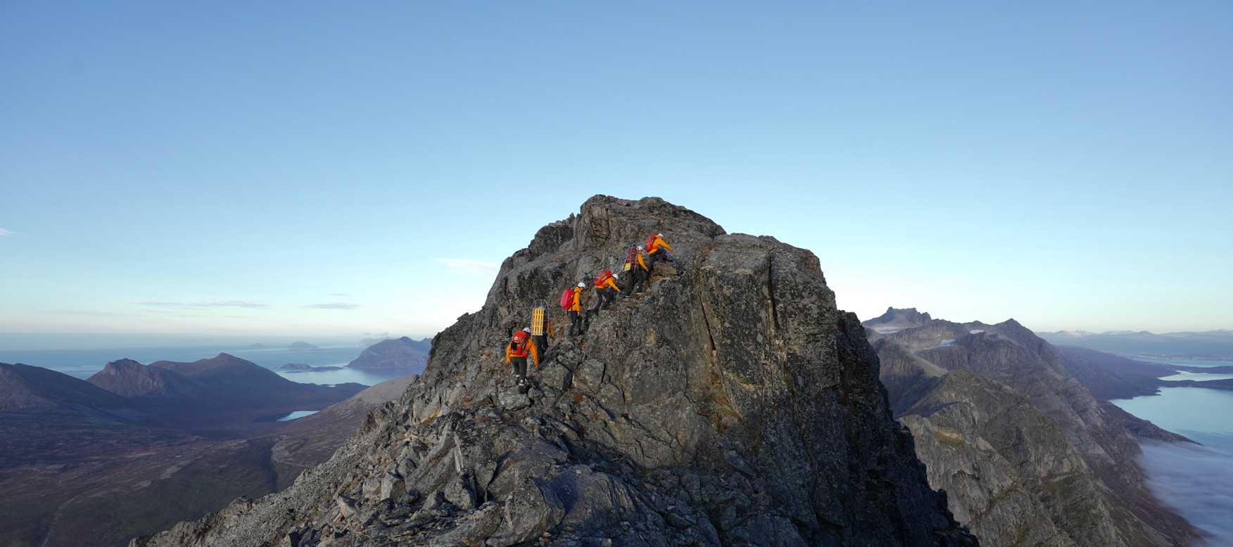 the team trekking up the mountain