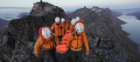 the team rescuing someone on the mountain