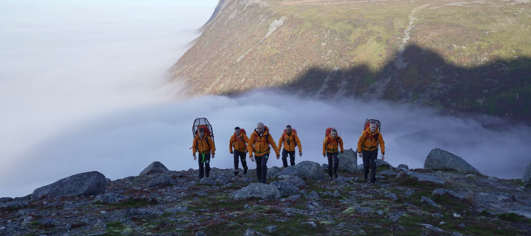 the team heading up the mountain