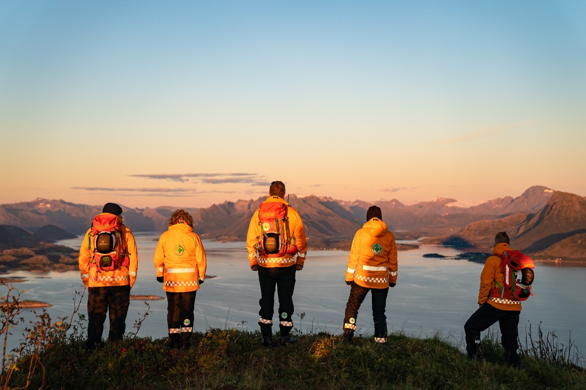 group of search and rescue professionals on the mountain