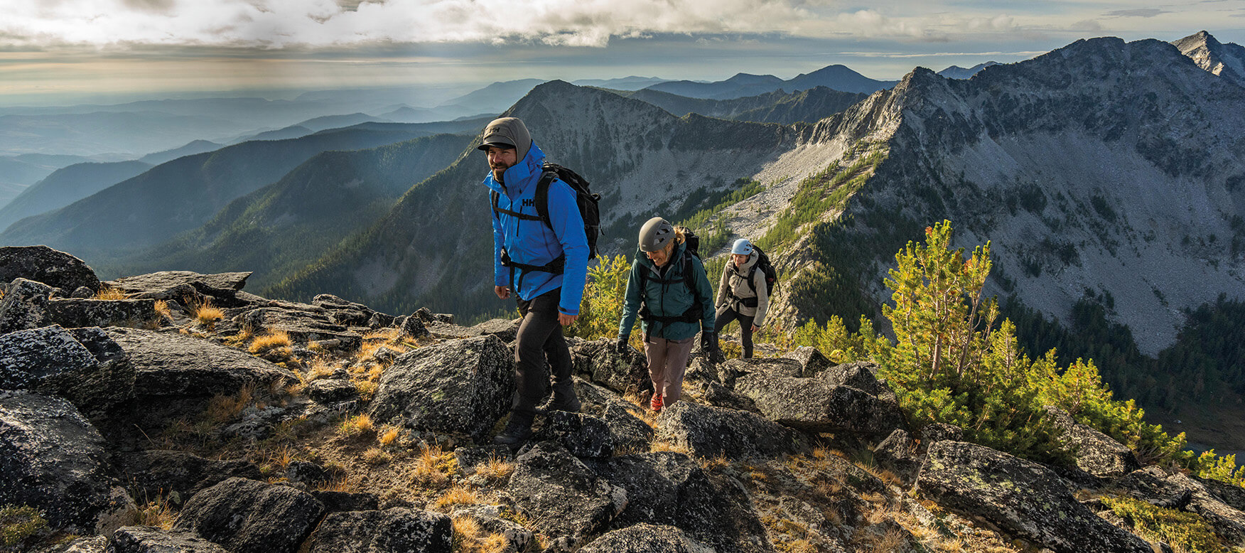 Three people hiking in the mountains