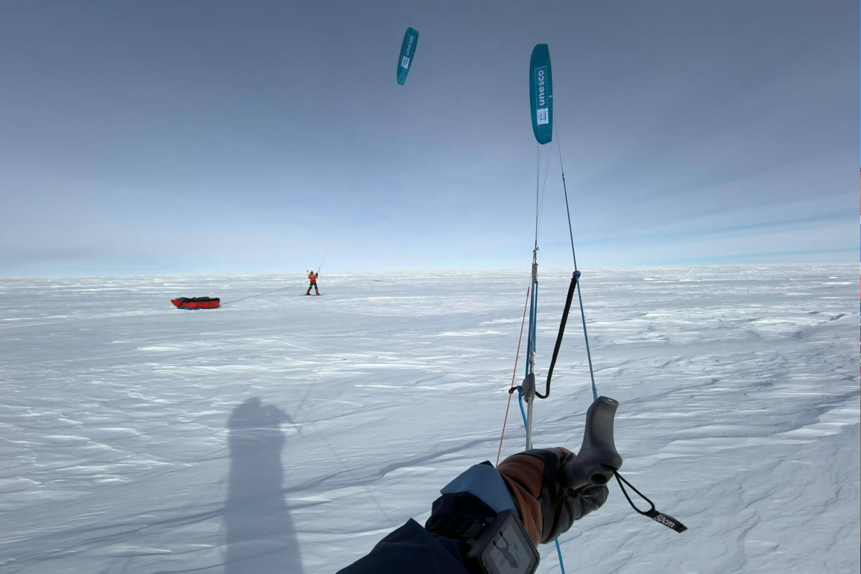 Two skiers kiting in Antarctica