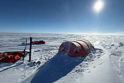 tent and skis in Antarctica