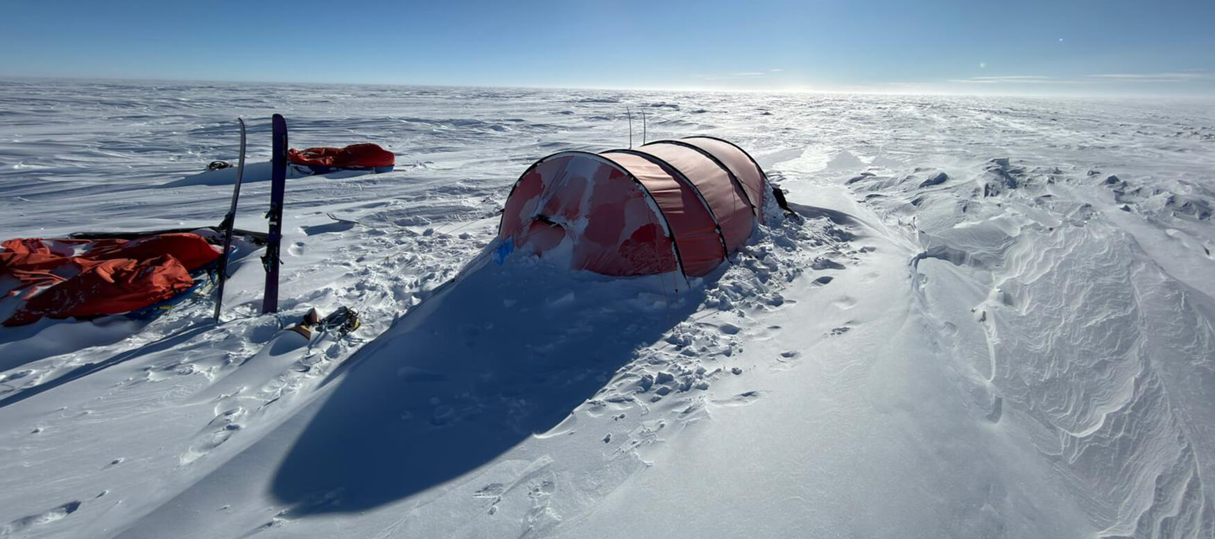 tent and skis in Antarctica