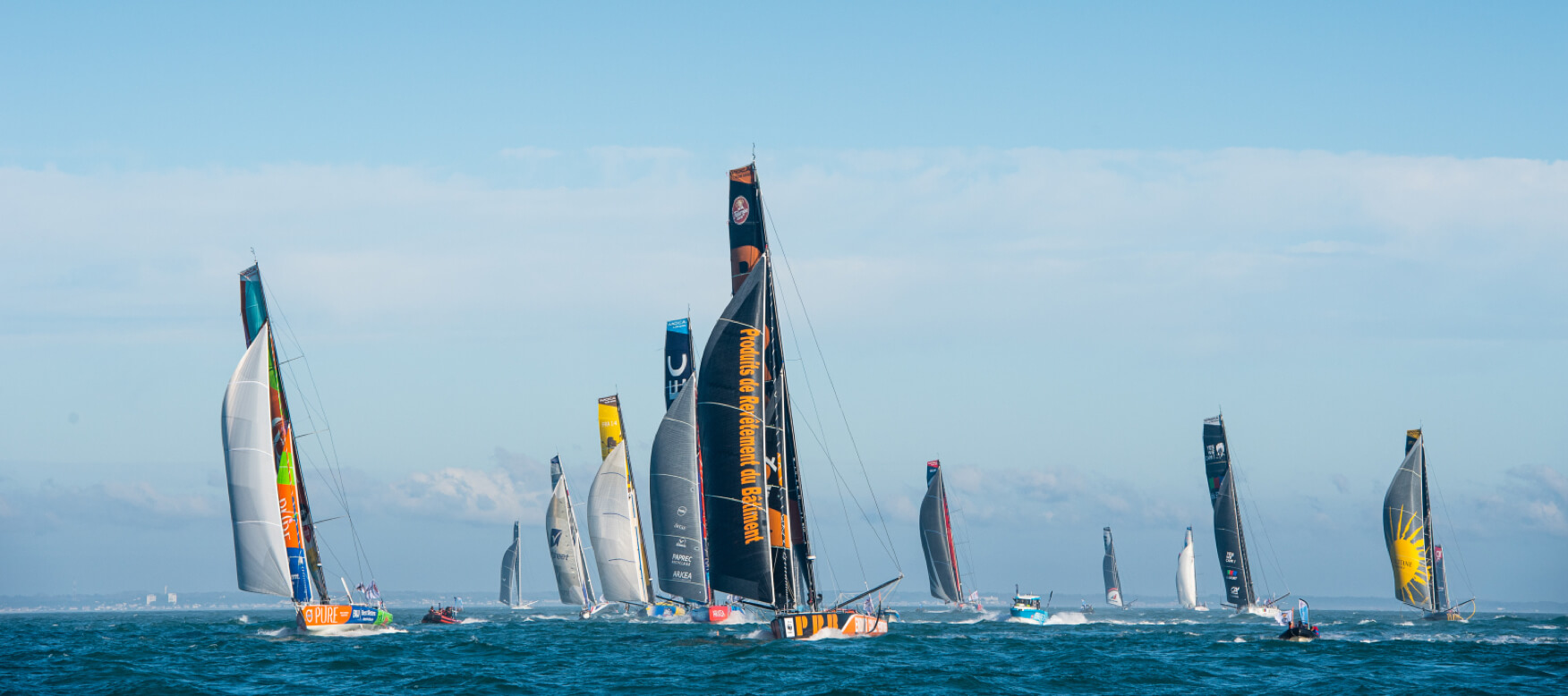 sailboats on the water racing the vendee globe