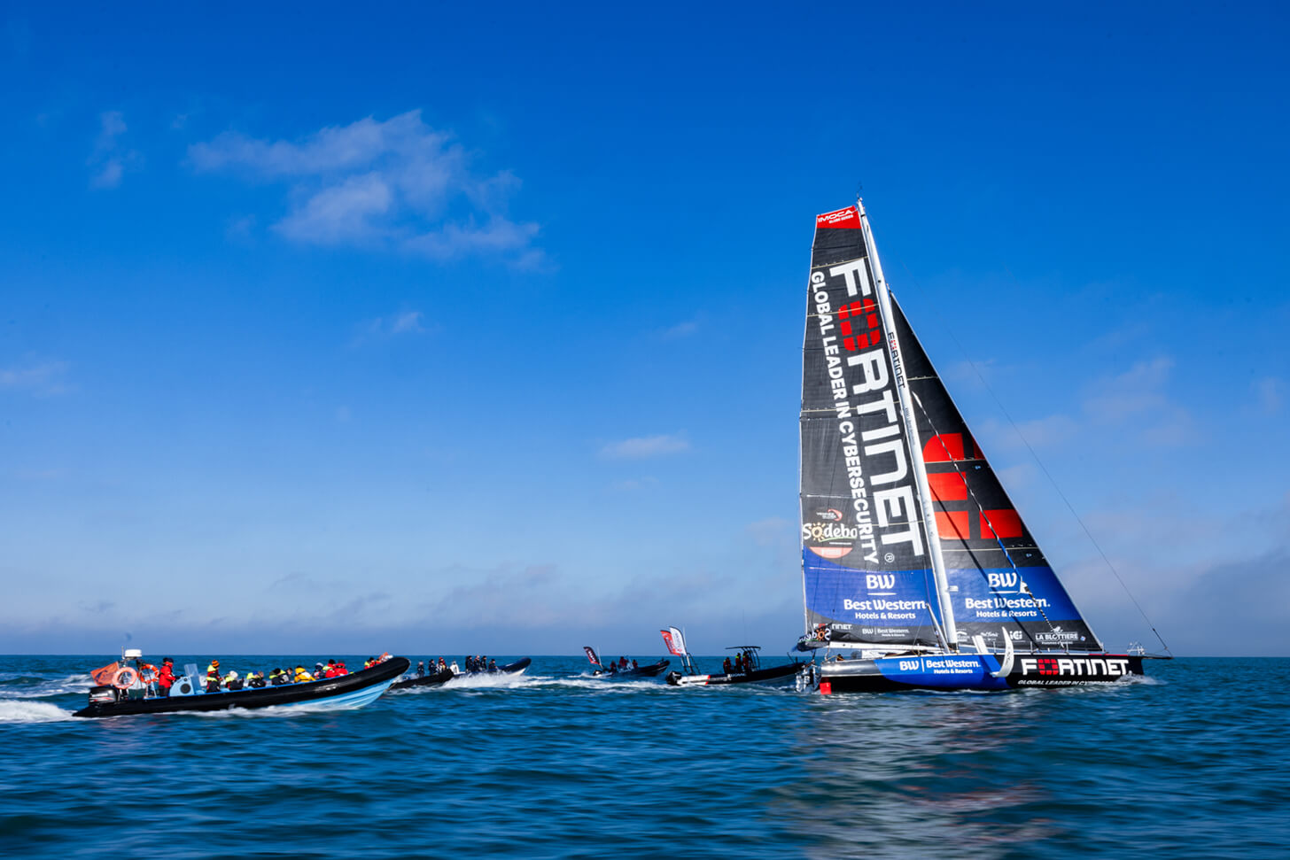 Sailboat during the Vendee Globe in rough waters