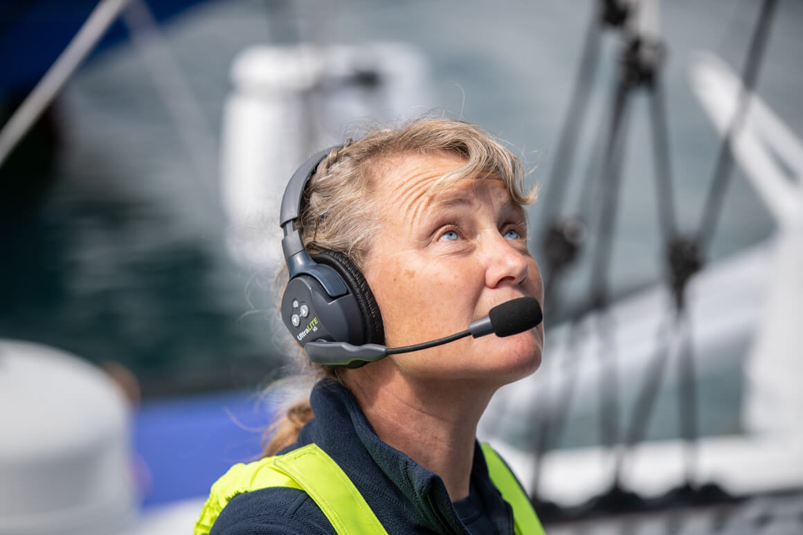 pip hare on the boat with headset on