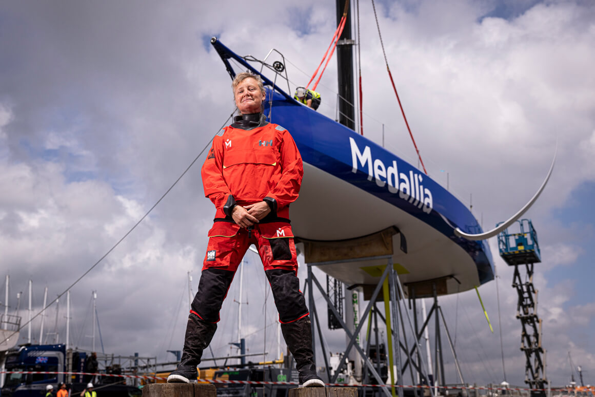 pip hare in front of her boat
