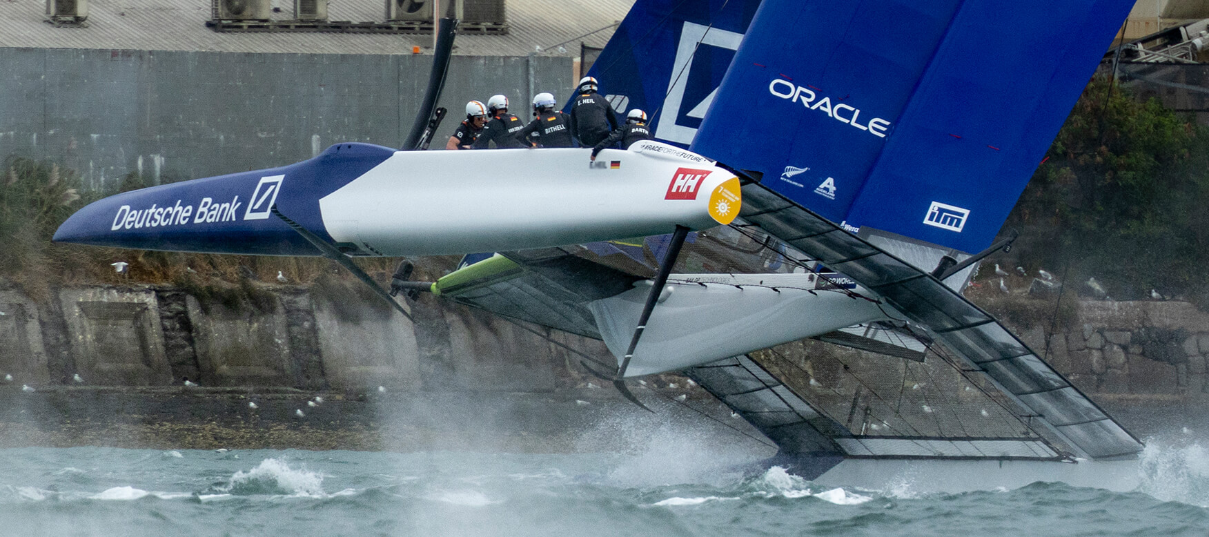 Foiling sailboats racing in SailGP