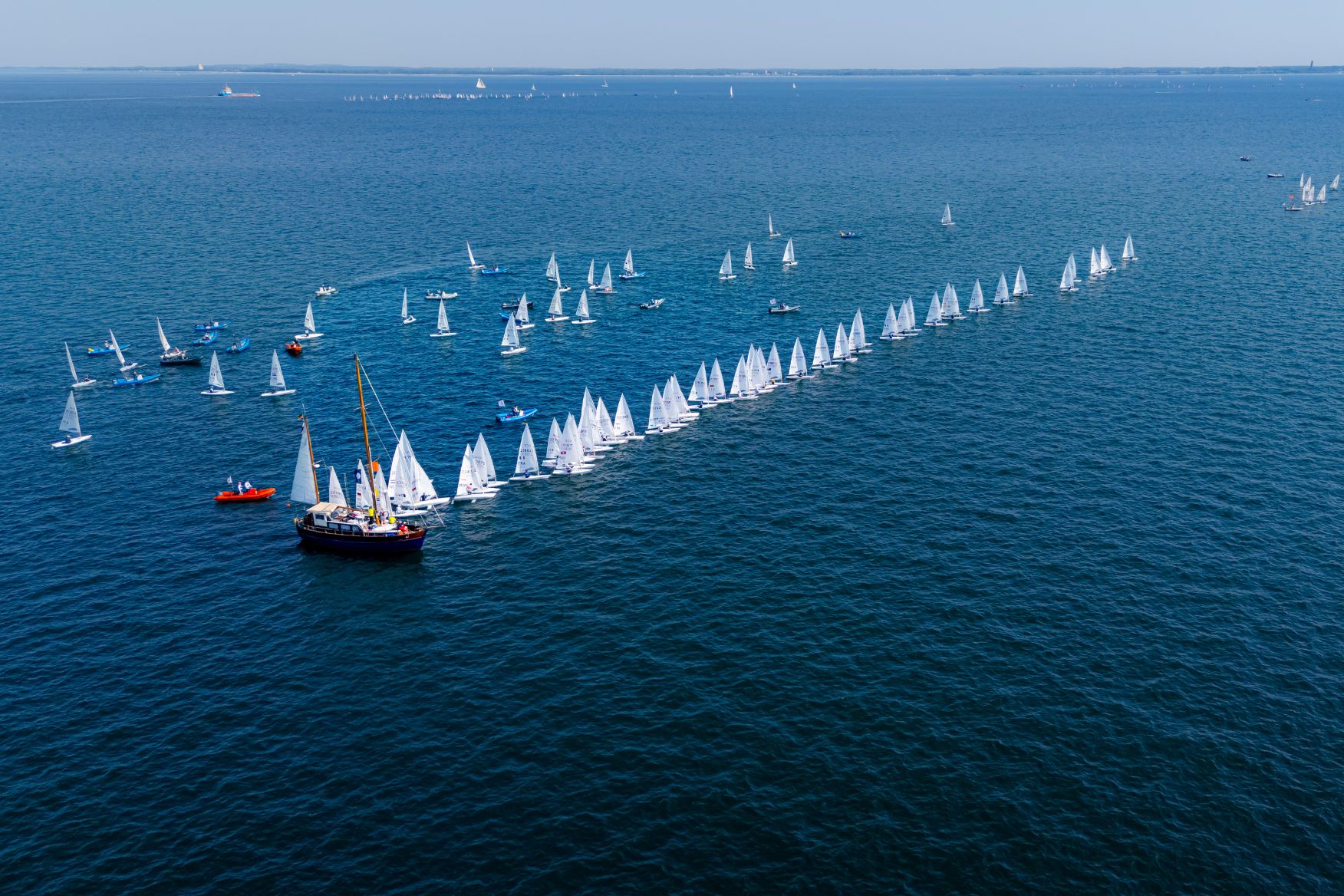 people sailing in the race