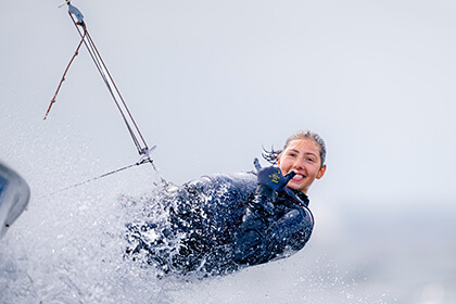 Woman in a dinghy at the Kieler Woche
