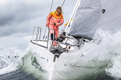 woman on a sailing boat going fast