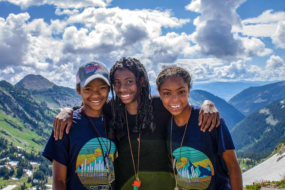 group of people in the mountains