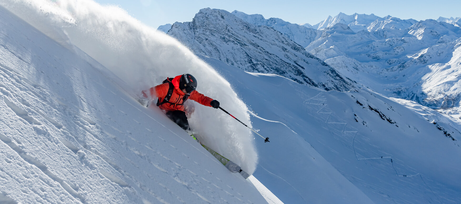person doing a backflip on skis