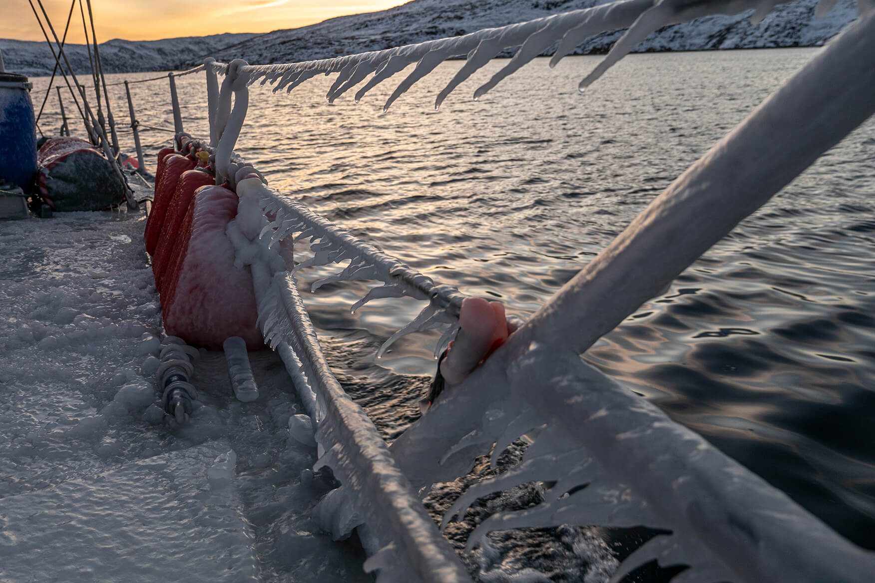 sailboat frozen with ice