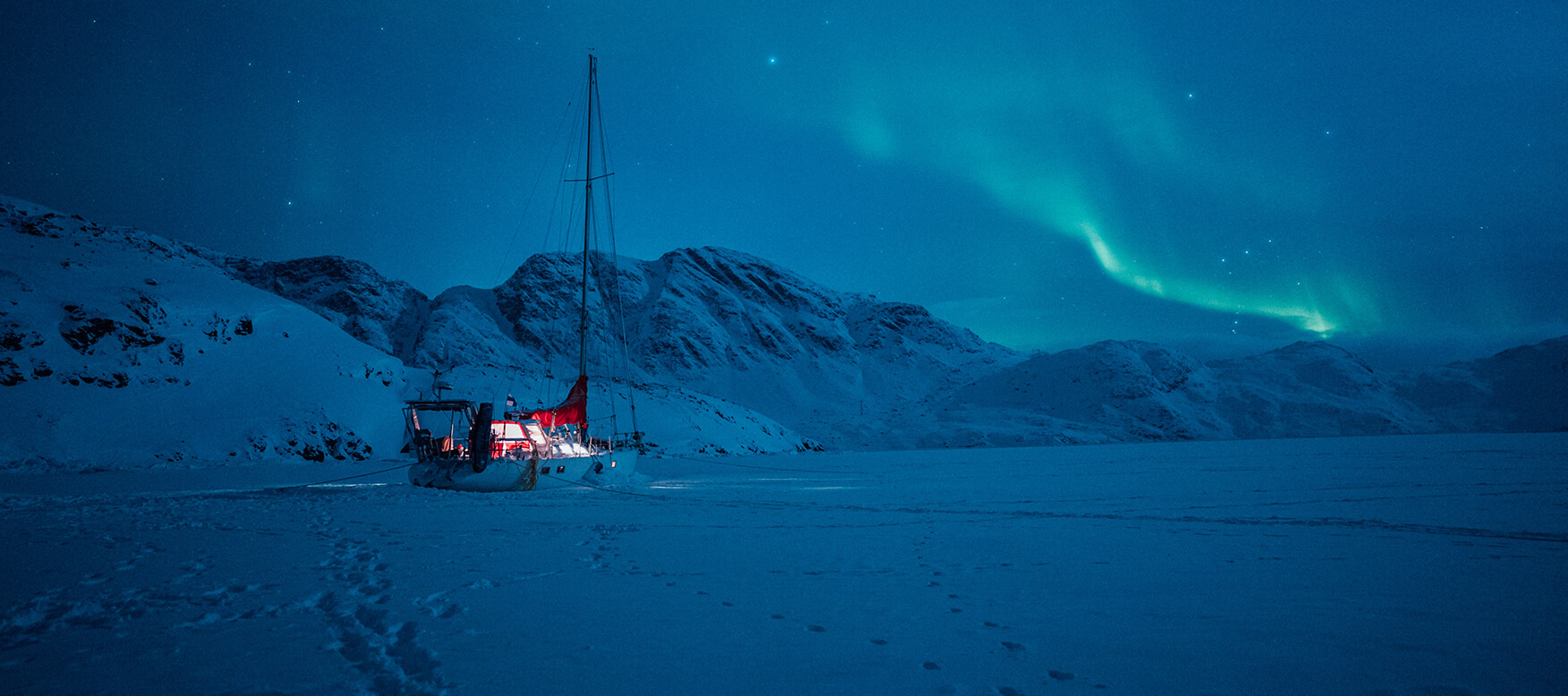 sailboat frozen in ice on Greenland
