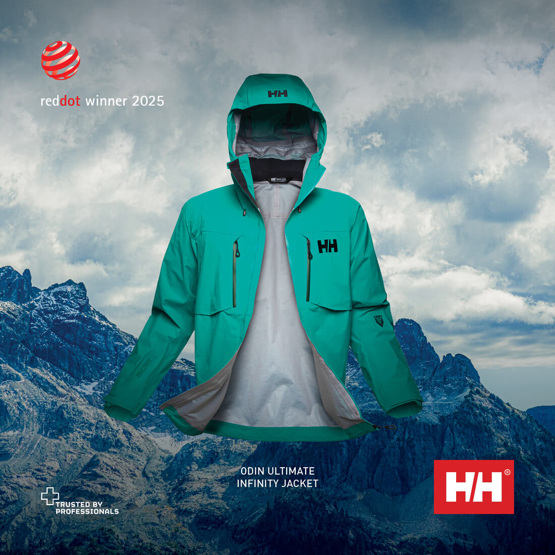 A green jacket in front of mountains