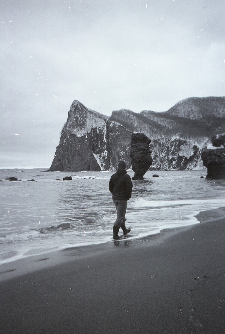 person walking on a beach