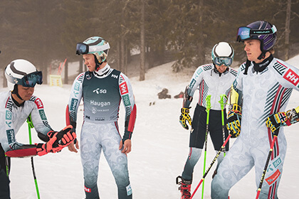 Alpine skiers standing on the slope