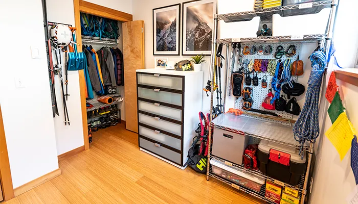 room with organised outdoor gear