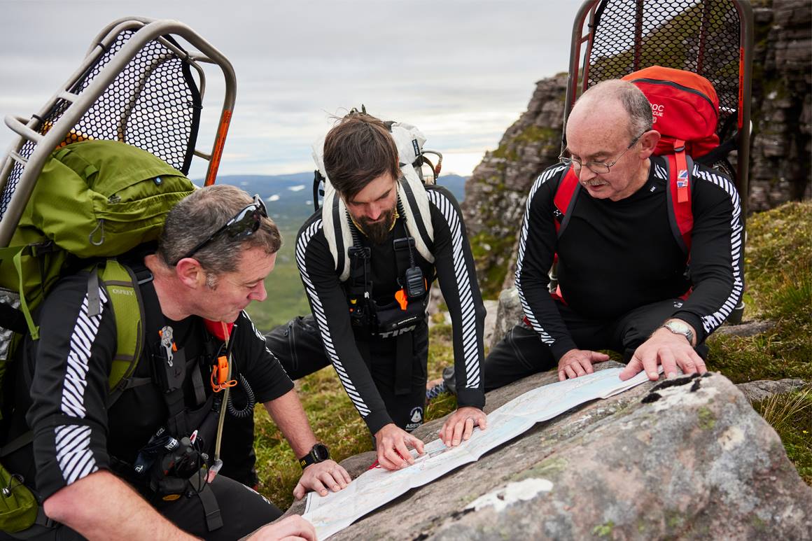 3 men hiking