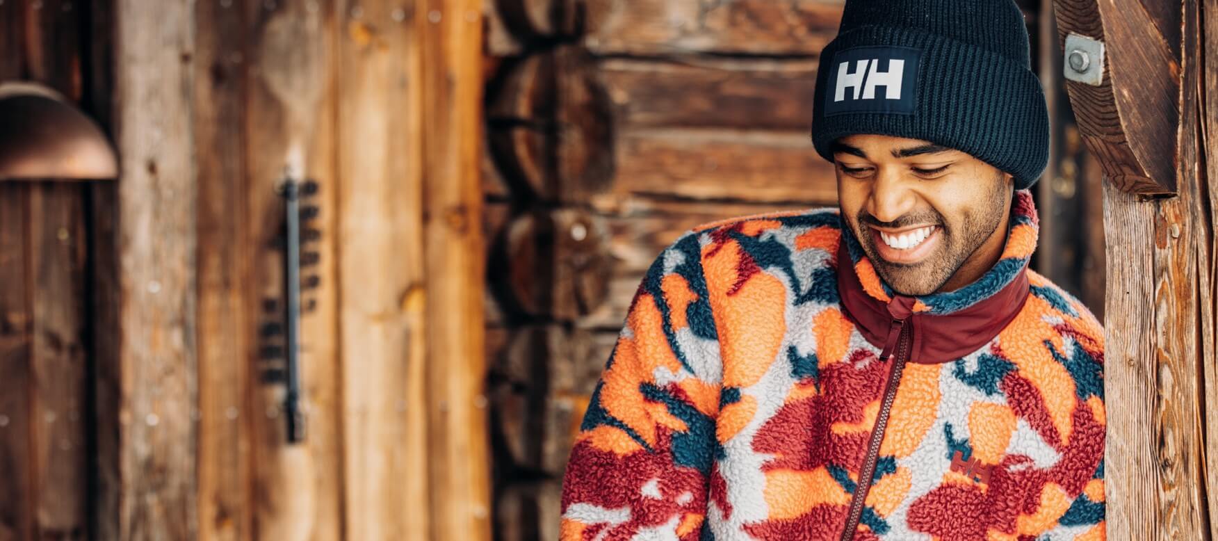 man in a cabin wearing a cozy pile jacket
