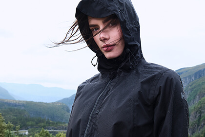 woman standing in the rain