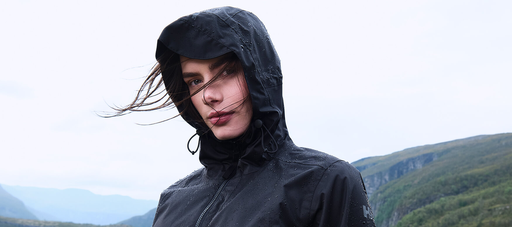 woman standing in the rain