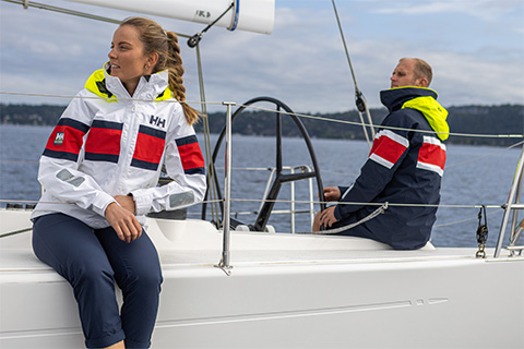 Two sailors on deck of a boat
