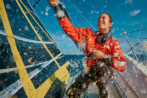 woman sailing a boat