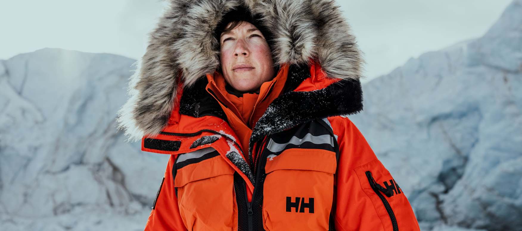 Woman in arctic conditions wearing a parka