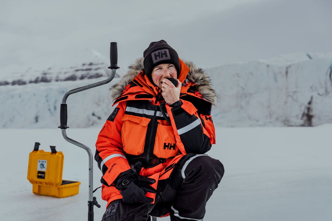 Dr. Heidi Sevestre putting the Arctic Patrol Modular Parka 2.0 into action Dr. Heidi Sevestre wearing the Arctic Patrol Modular Parka 2.0 in the snow