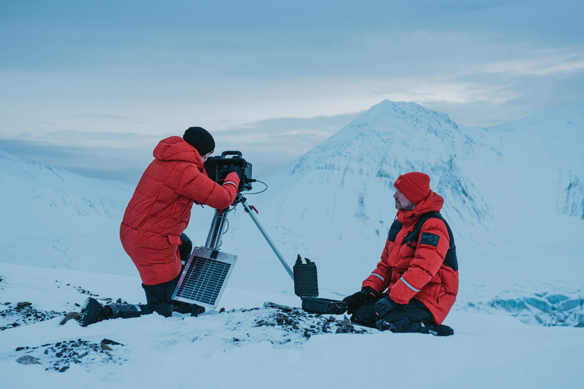 2 scientists in the snow