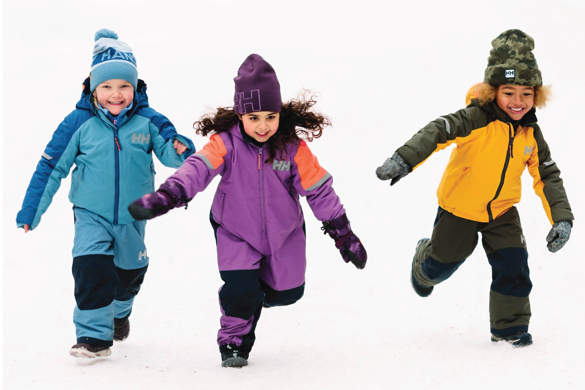 3 kids playing in the snow