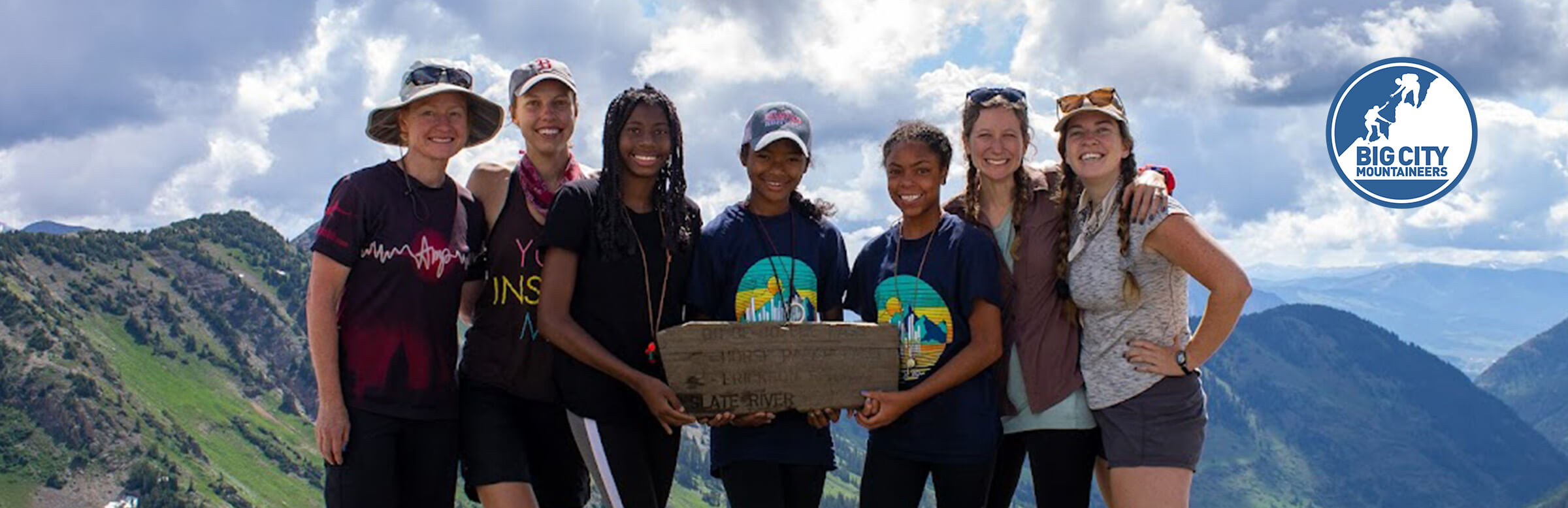 group of people hiking in the mountains