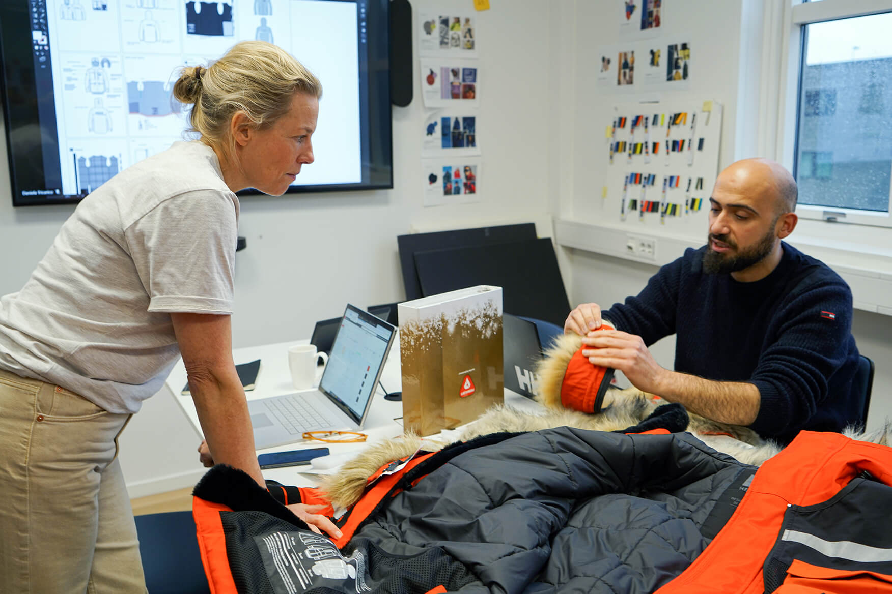 The design team at work on the Arctic Patrol Down Parka