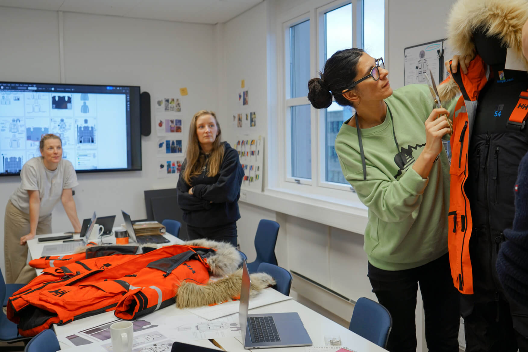 The design team at work on the Arctic Patrol Down Parka