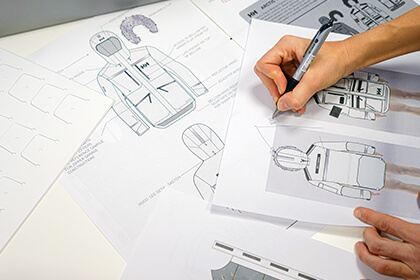 The design team at work on the Arctic Patrol Down Parka