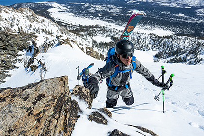 man backcountry skiing in the Odin BC Infinity Shell Jacket and Odin BC Infinity Shell Pants