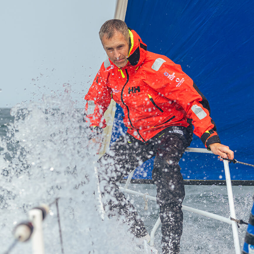 Sailor on deck of a sailing boat